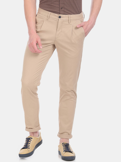 

Arrow Sport Men Beige Slim Fit Solid Regular Trousers
