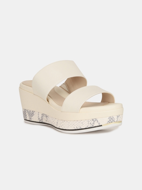 

Cole Haan Women Off-White Solid Leather Heels