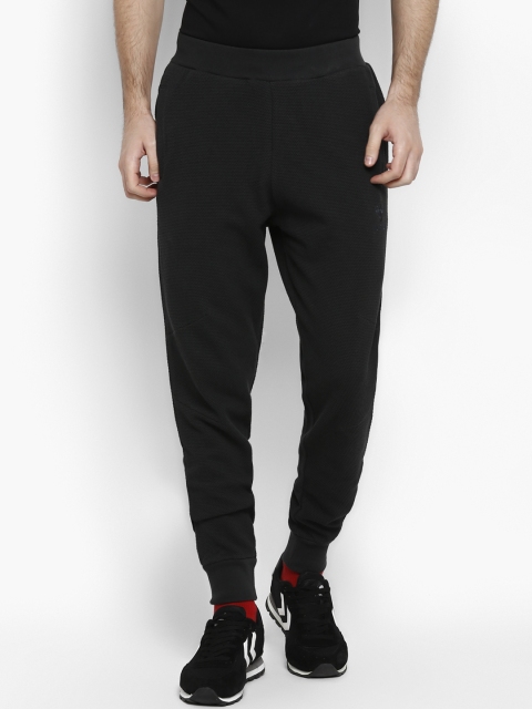 

hummel Men Black Solid Joggers