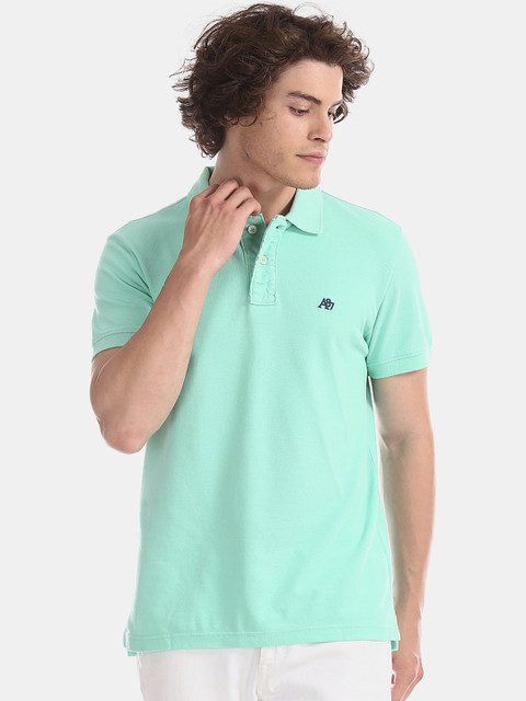 

Aeropostale Men Green Solid Polo Collar Pure Cotton T-shirt