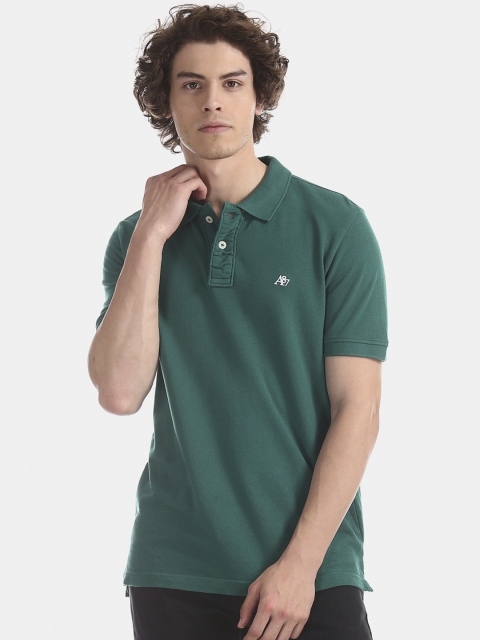 

Aeropostale Men Green Solid Polo Collar Pure Cotton T-shirt