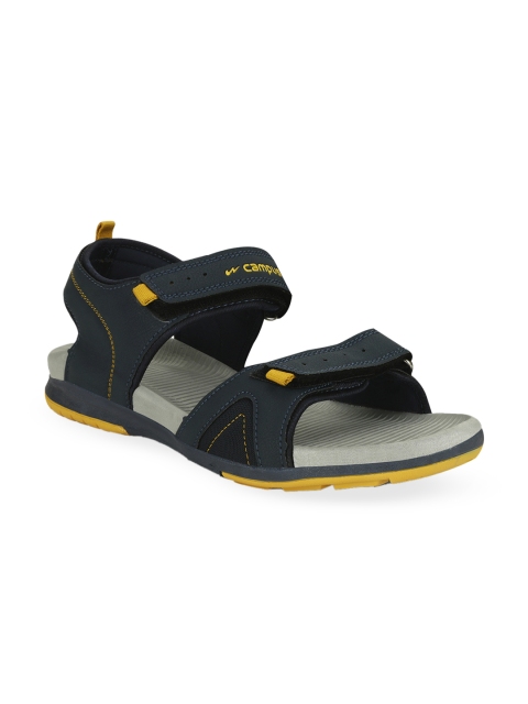 

Campus Men Teal Green & Yellow Solid Sports Sandals