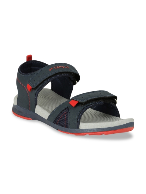 

Campus Men Teal Green & Red Solid Sports Sandals