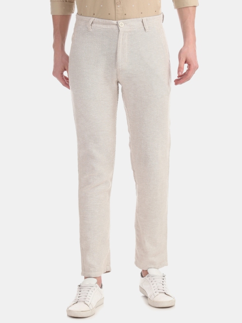 

Cherokee Men Beige Slim Fit Self Design Regular Trousers