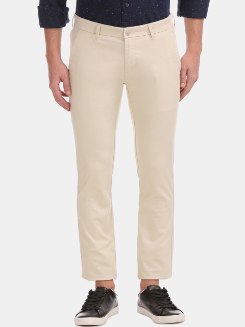 

Ruggers Men Beige Tapered Fit Solid Regular Trousers