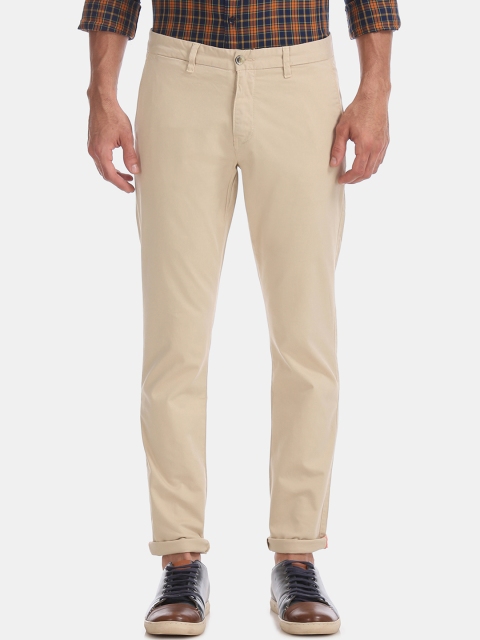 

Ruggers Men Beige Slim Fit Solid Regular Trousers