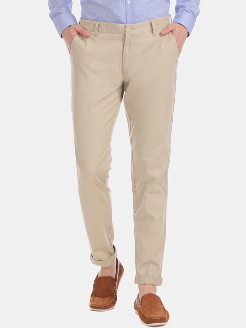 

Ruggers Men Beige Regular Fit Solid Regular Trousers