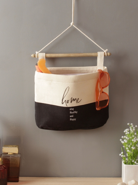 

Rajasthan Decor Off-White & Black Colourblocked Multipurpose Wall-Hanging Organizer
