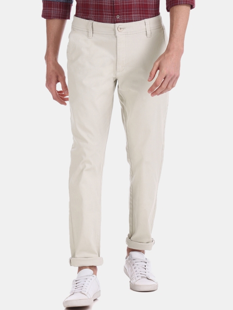 

Ruggers Men Beige Slim Fit Solid Regular Trousers
