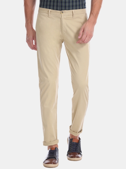 

Ruggers Men Beige Regular Fit Solid Regular Trousers