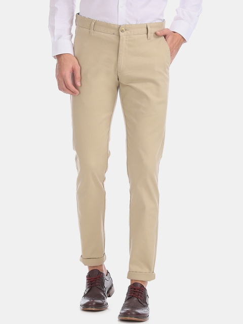 

Ruggers Men Beige Regular Fit Solid Regular Trousers