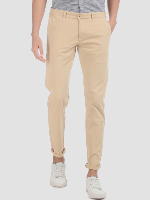 

Ruggers Men Beige Regular Fit Solid Regular Trousers