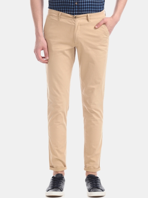 

Ruggers Men Beige Regular Fit Solid Regular Trousers