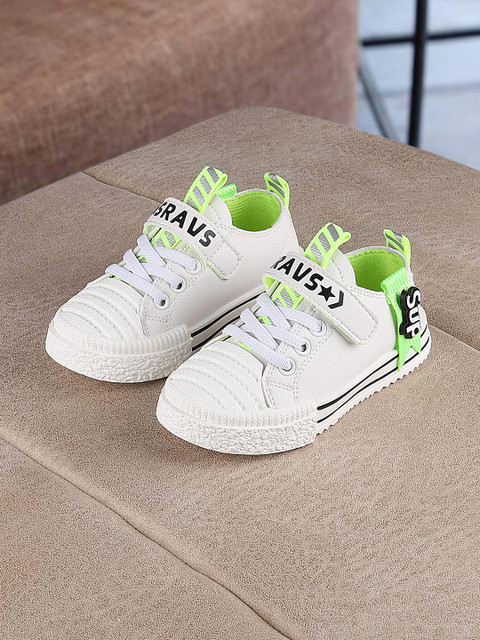 

Walktrendy Kids White Slip-On Sneakers