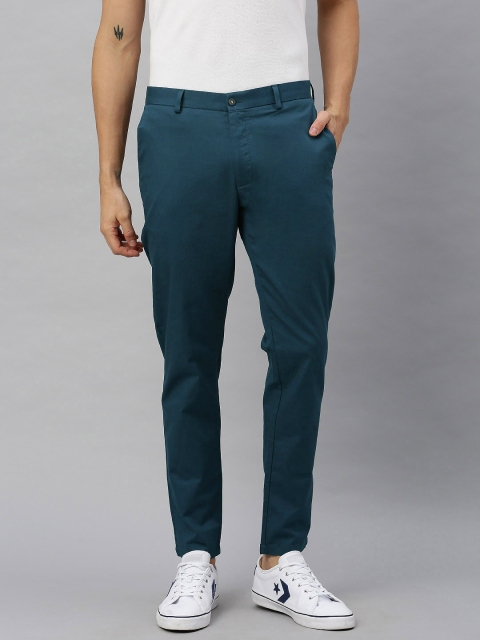 

Blackberrys Men Teal Blue Regular Fit Self Design Regular Trousers