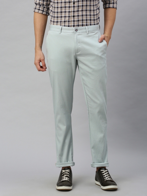 

Blackberrys Men Blue Tapered Fit Self Design Regular Trousers