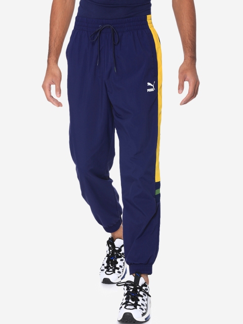 

Puma Men Navy Blue Solid Straight Fit XTG Joggers with Side Tape Detail