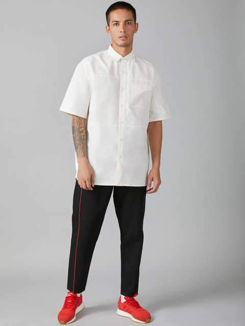 

Bhaane Men Black Jogger Mid-Rise Clean Look Jeans
