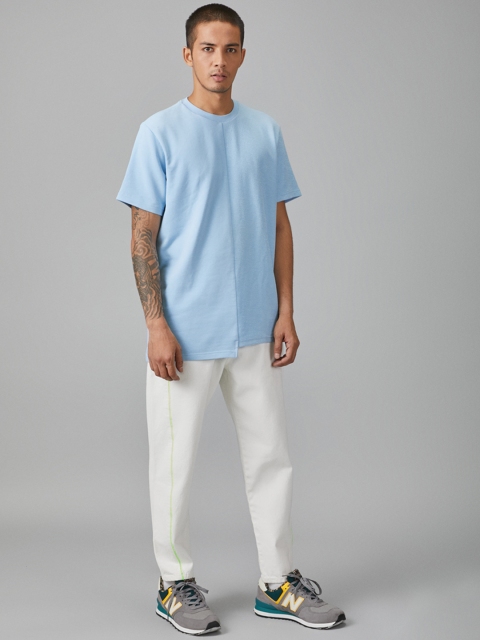 

Bhaane Men White Jogger Mid-Rise Clean Look Jeans