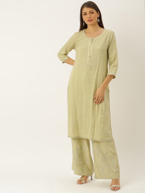 

Soch Women Green Solid Kurta with Palazzos