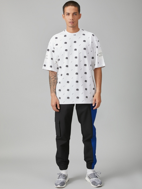 

Bhaane Men Blue & Black Tapered Fit Printed Joggers
