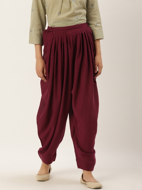 

Ritu Kumar Women Burgundy Solid Salwar