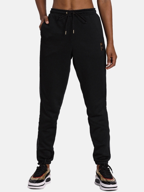 

Puma X CHARLOTTE OLYMPIA Men Black Solid Straight-Fit Sport Joggers