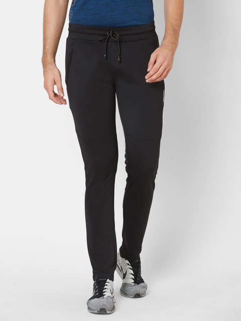 

Sweet Dreams Men Black Solid Track Pants