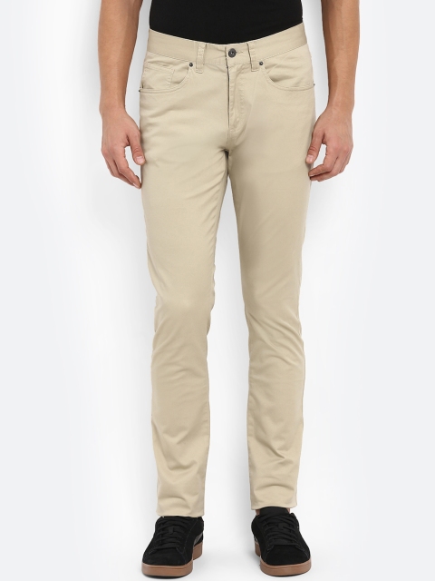 

Red Tape Men Beige Slim Fit Solid Regular Trousers