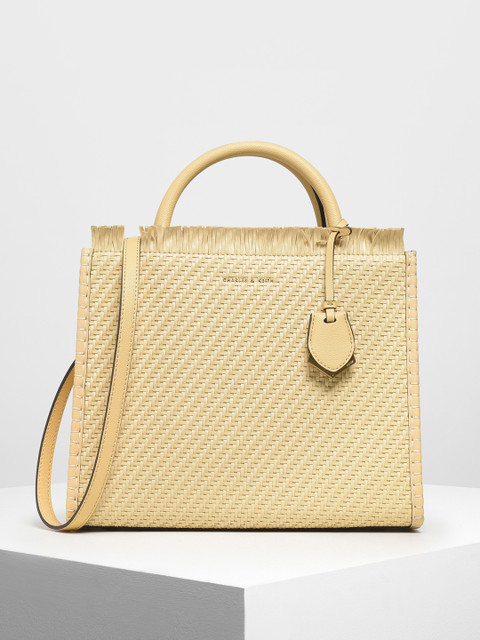 

CHARLES & KEITH Beige Textured Handheld Bag