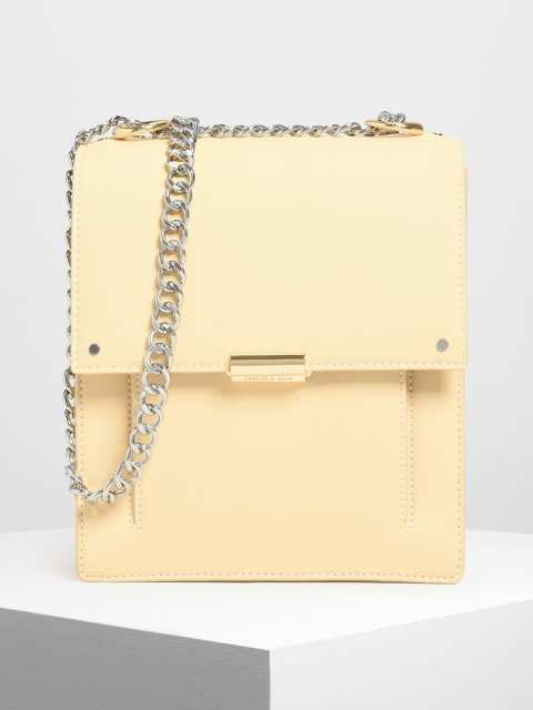 

CHARLES & KEITH Yellow Solid Sling Bag