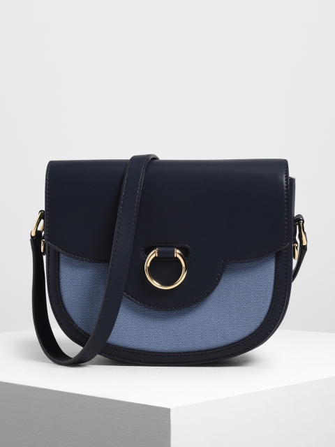 

CHARLES & KEITH Navy Blue & Blue Colourblocked Half Moon Shaped Sling Bag