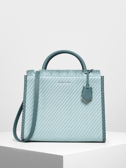 

CHARLES & KEITH Teal Green Self Design Handheld Bag