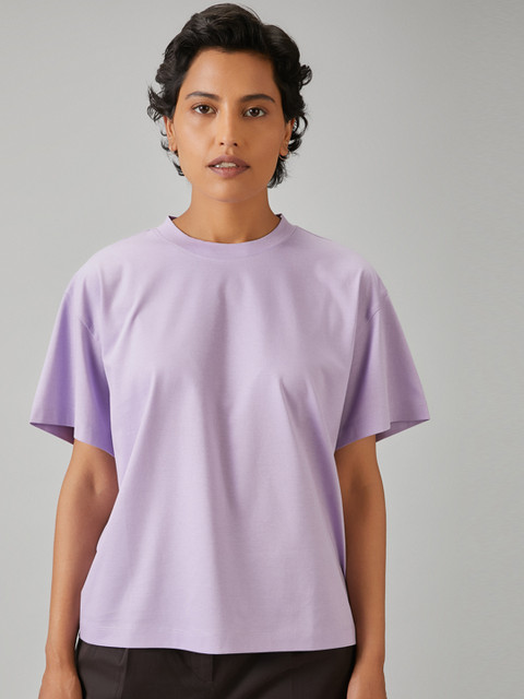 

Bhaane Women Lavender Solid Loose Fit Round Neck T-shirt