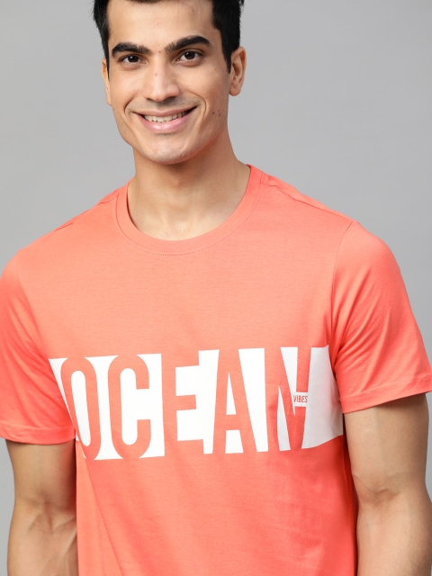 

Mast & Harbour Men Coral Orange & White Printed Round Neck T-shirt