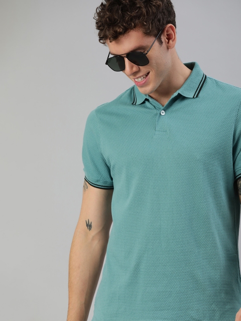 

Mast Harbour Men Teal Blue Self Design Polo Collar Pure Cotton T-shirt