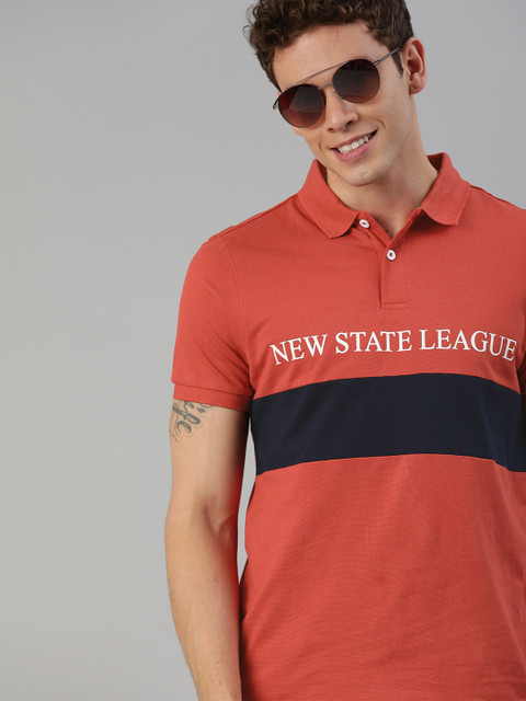

Mast & Harbour Men Coral Pink & Navy Blue Printed Polo Collar T-shirt