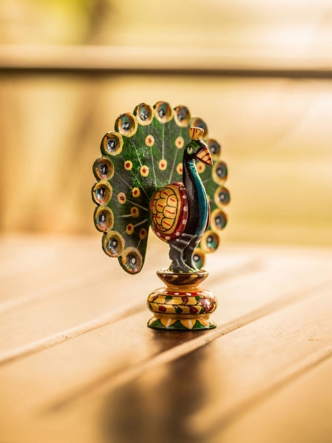 

ExclusiveLane Green & Yellow Handmade & Handpainted Wooden Peacock Showpiece