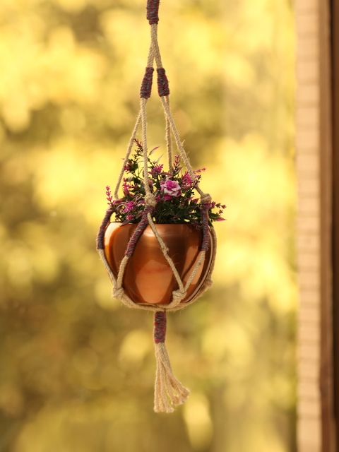 

ExclusiveLane Copper Toned Macrame-Knotted Hanging Planter Pot In Iron With Jute