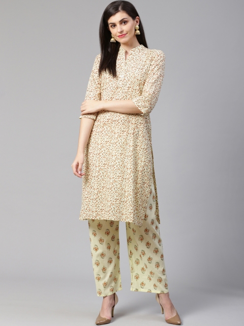 

Jompers Women Yellow & Rust Orange Floral Printed Kurta with Palazzos