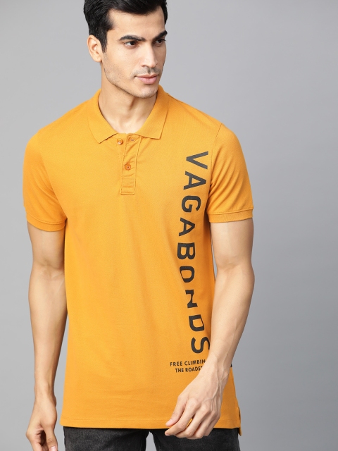 

Roadster Men Mustard Yellow & Black Solid Polo Collar T-shirt