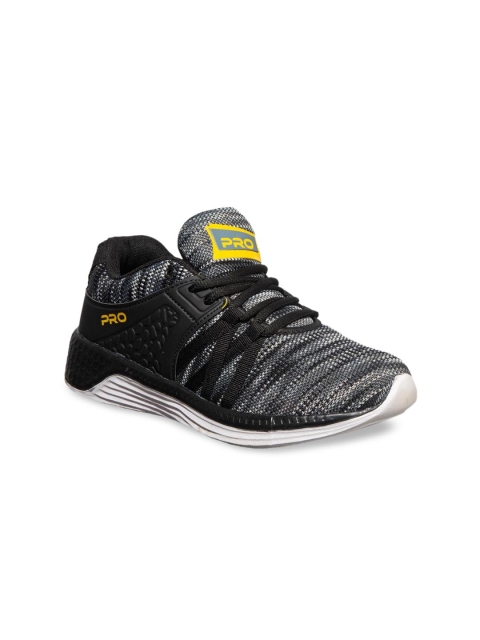 

Khadims Men Black & White Textile Running Shoes