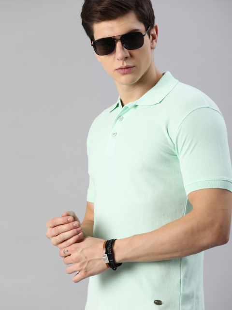 

Roadster Men Sea Green Solid Polo Collar T-shirt