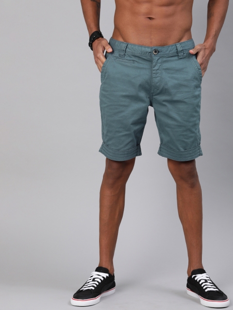 

Roadster Men Teal Blue Solid Regular Fit Regular Shorts