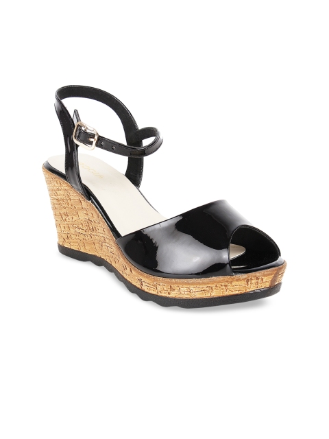 

Rocia Women Black Solid Sandals