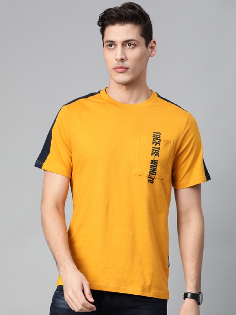 

Roadster Men Mustard Yellow Solid Round Neck T-shirt