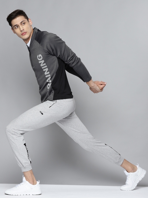 

HRX by Hrithik Roshan Men Anthra Melange Solid Slim Fit Training Sweatshirt, Grey