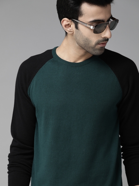 

Roadster Men Green Solid Pullover Sweater