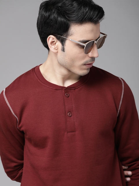 

Roadster Men Maroon Solid Sweatshirt