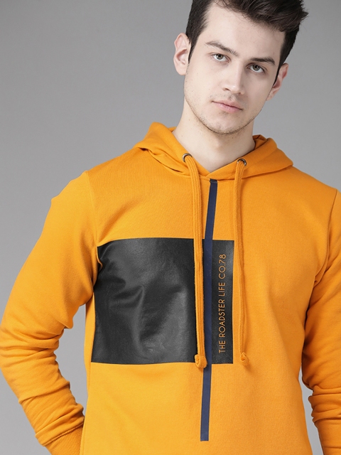 

Roadster Men Mustard Yellow & Black Colourblocked Hooded Sweatshirt